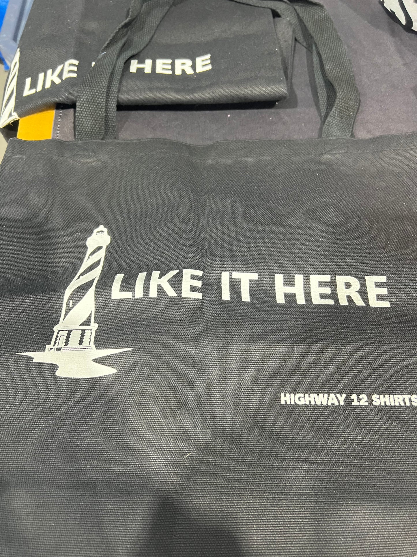 I Like it Here. tote bag