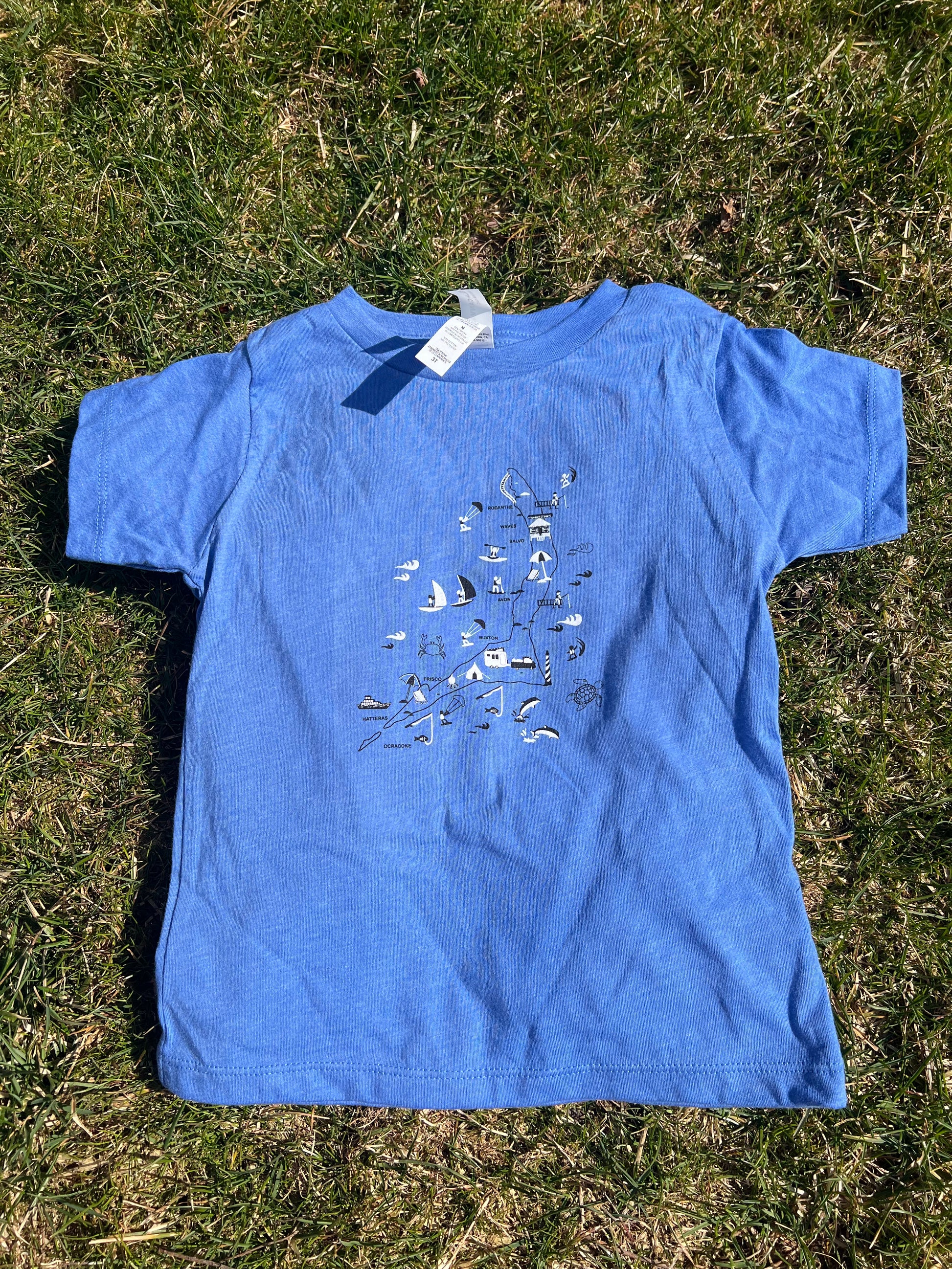A blue toddler tee with a graphic print in the center, displayed on a flat surface.