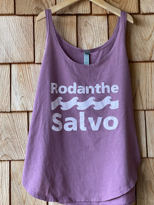 Purple tank top with 'Rodanthe Salvo' text on a wooden surface and waves logo.