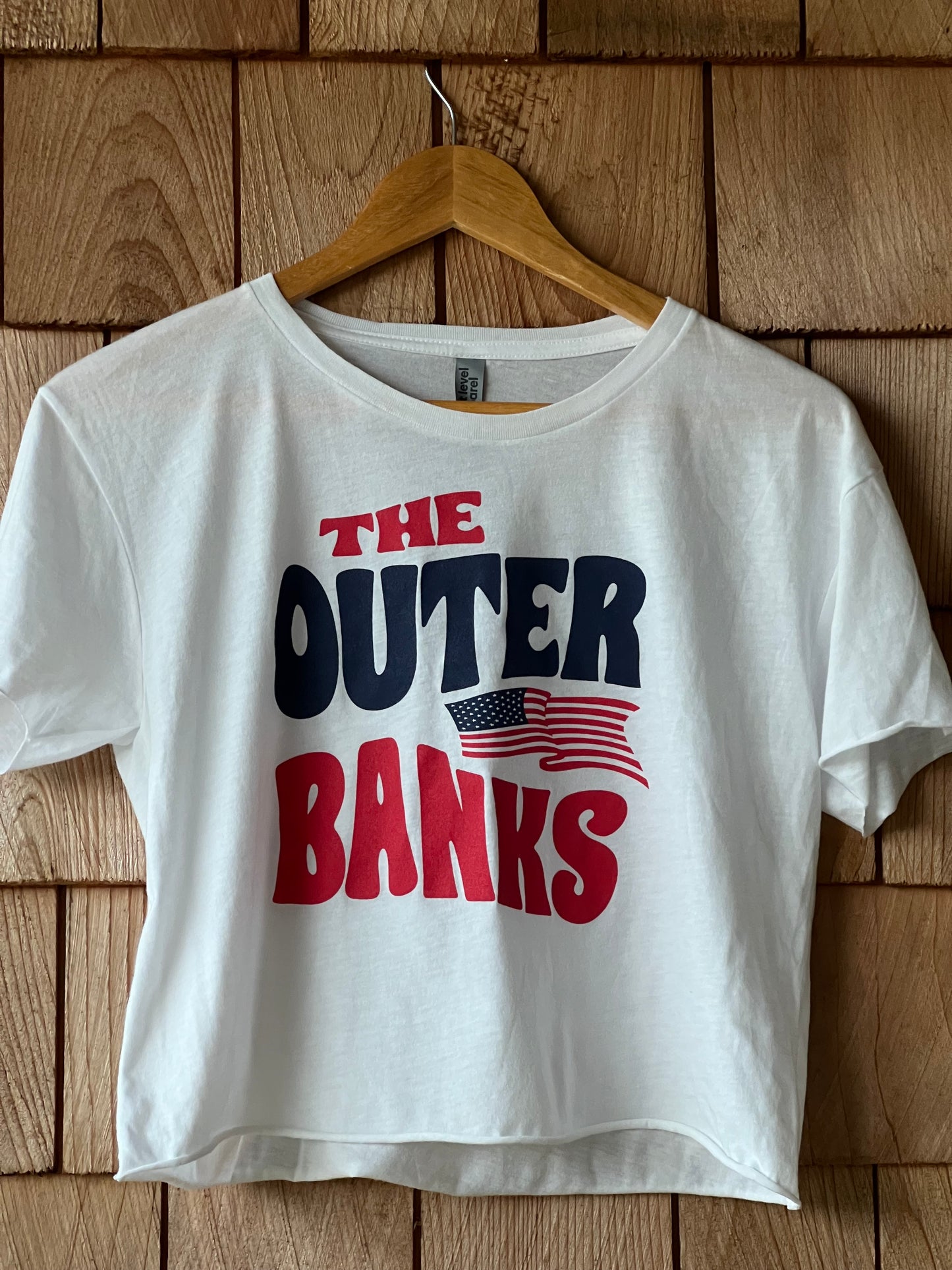 White crop top with 'The Outer Banks' text 