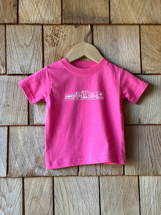 Pink t-shirt on a wooden surface